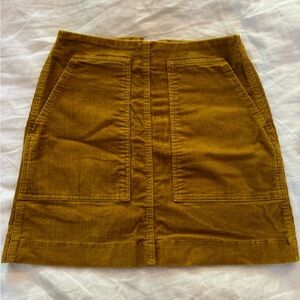 Dark yellow mini skirt size small